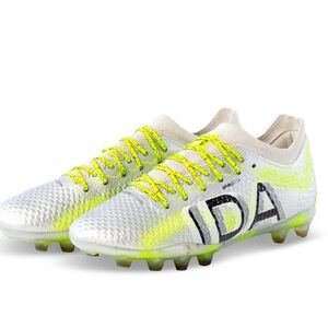 Silver and Green Soccer Cleats